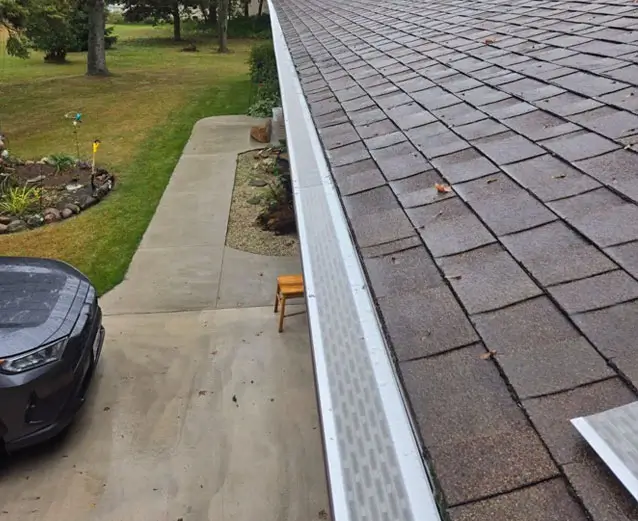 Before and after gutter guard installation comparison